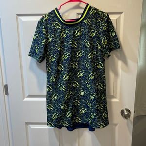 Neon color green with dark blue dress